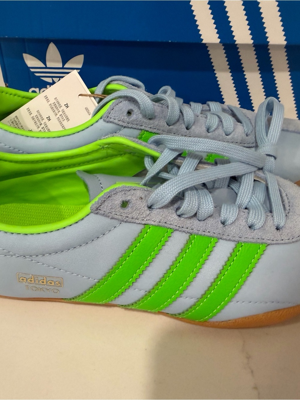 adidas Light Blue Sneakers with Neon Green Stripes